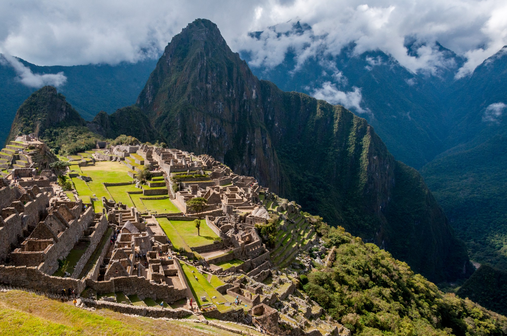Machu Picchu ancient Inca ruins surrounded by dramatic mountains in Peru
