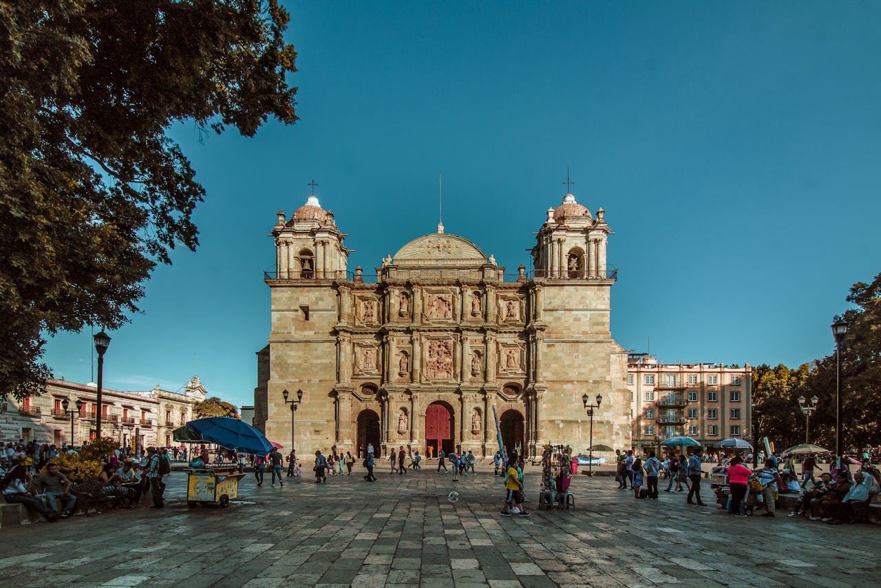 Historic cathedral and lively public square in Oaxaca, Mexico