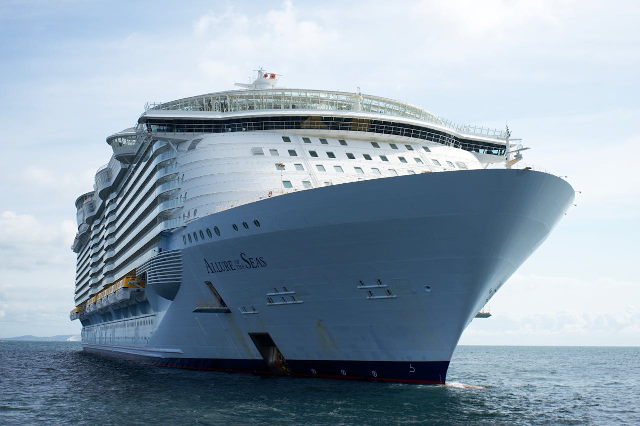 Large Allure of the Seas cruise ship sailing at sea