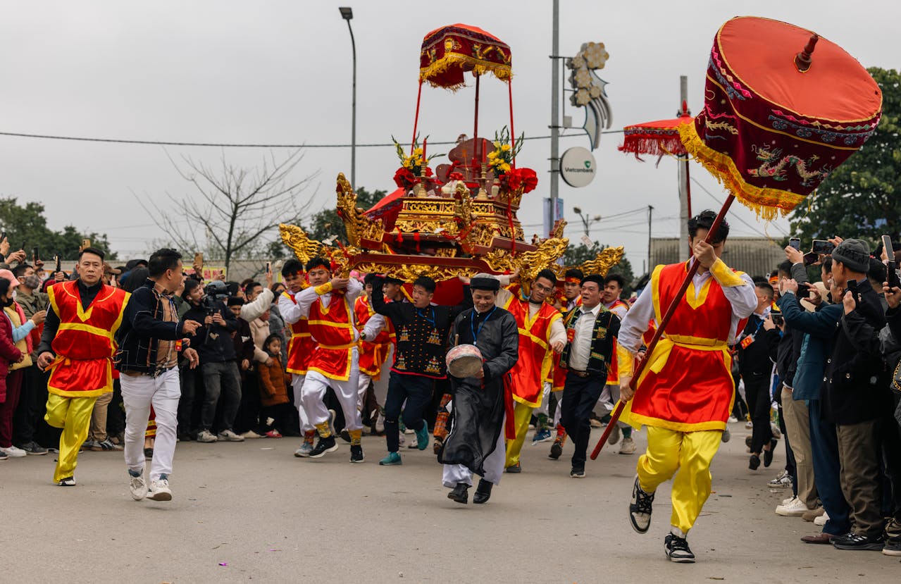 Traditional Vietnamese festival procession with colorful ceremonial costumes